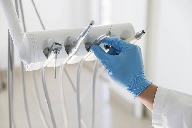 Professional Tooth Extraction technician working in Davenport, IA
